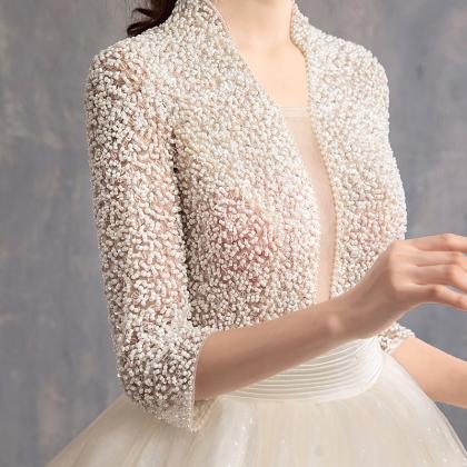 Handmade Elegant Long-sleeved Beaded Wedding Dress..