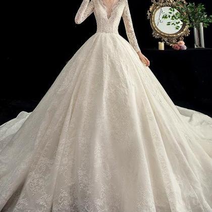 Handmade Luxury Ivory Transparent Wedding Gown..
