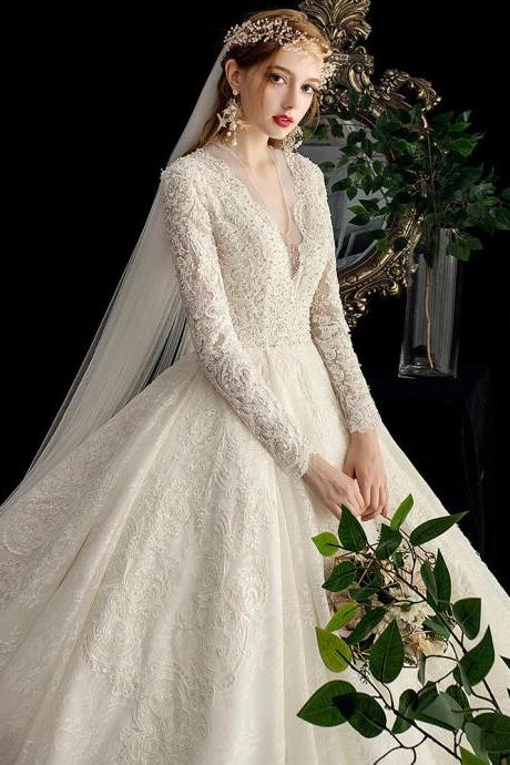 handmade Luxury ivory transparent wedding gown new ball graduation gown spoon neck long sleeve sleeve backless handmade beads shimmering tulle cathedral drape bridal gown